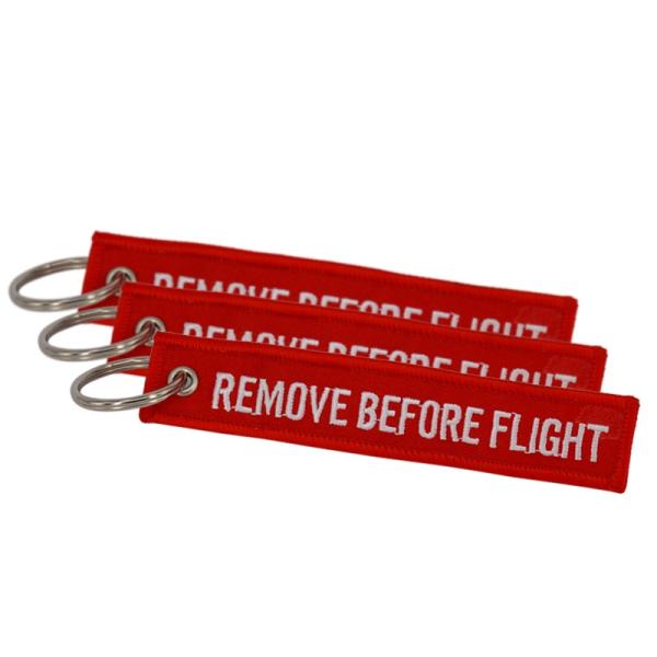 Schlüsselanhänger REMOVE BEFORE FLIGHT rot